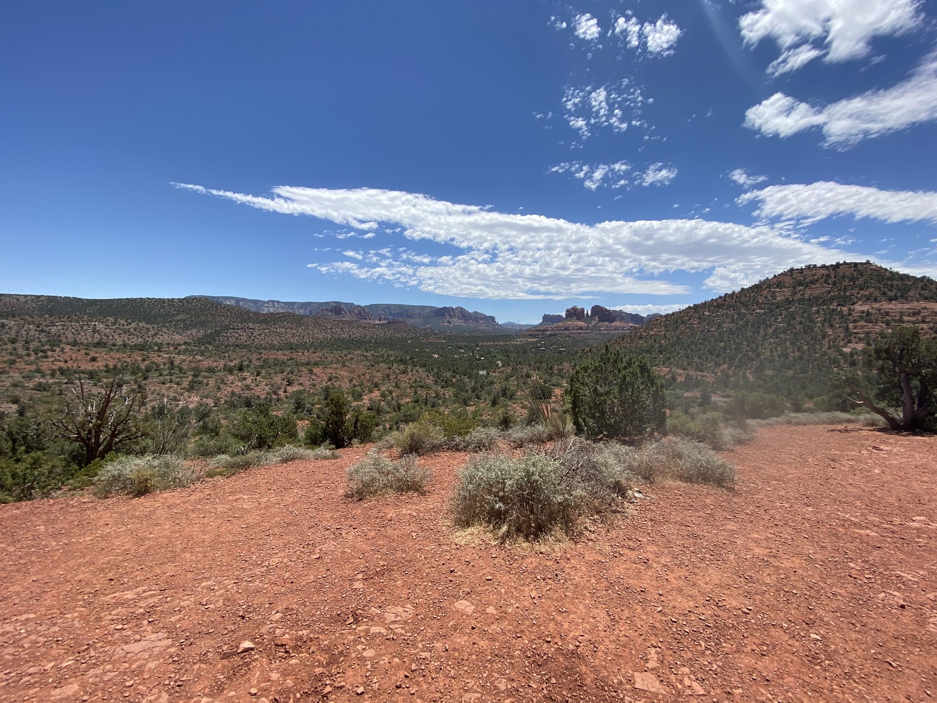 Panoramic Sedona red rock landscape under blue sky